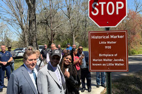 Lieutenant Governor Billy Nungesser and legendary Louisiana blues guitarist Buddy Guy stand next to a historical marker noting the birthplace of Little Walter.