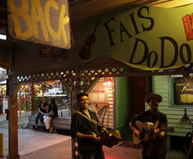Musicians outside of the Blue Moon Saloon in Lafayette, Louisiana